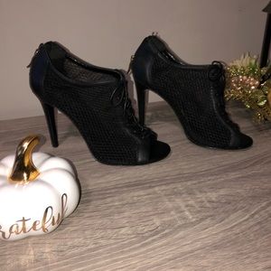 BCBG black booties in excellent used condition